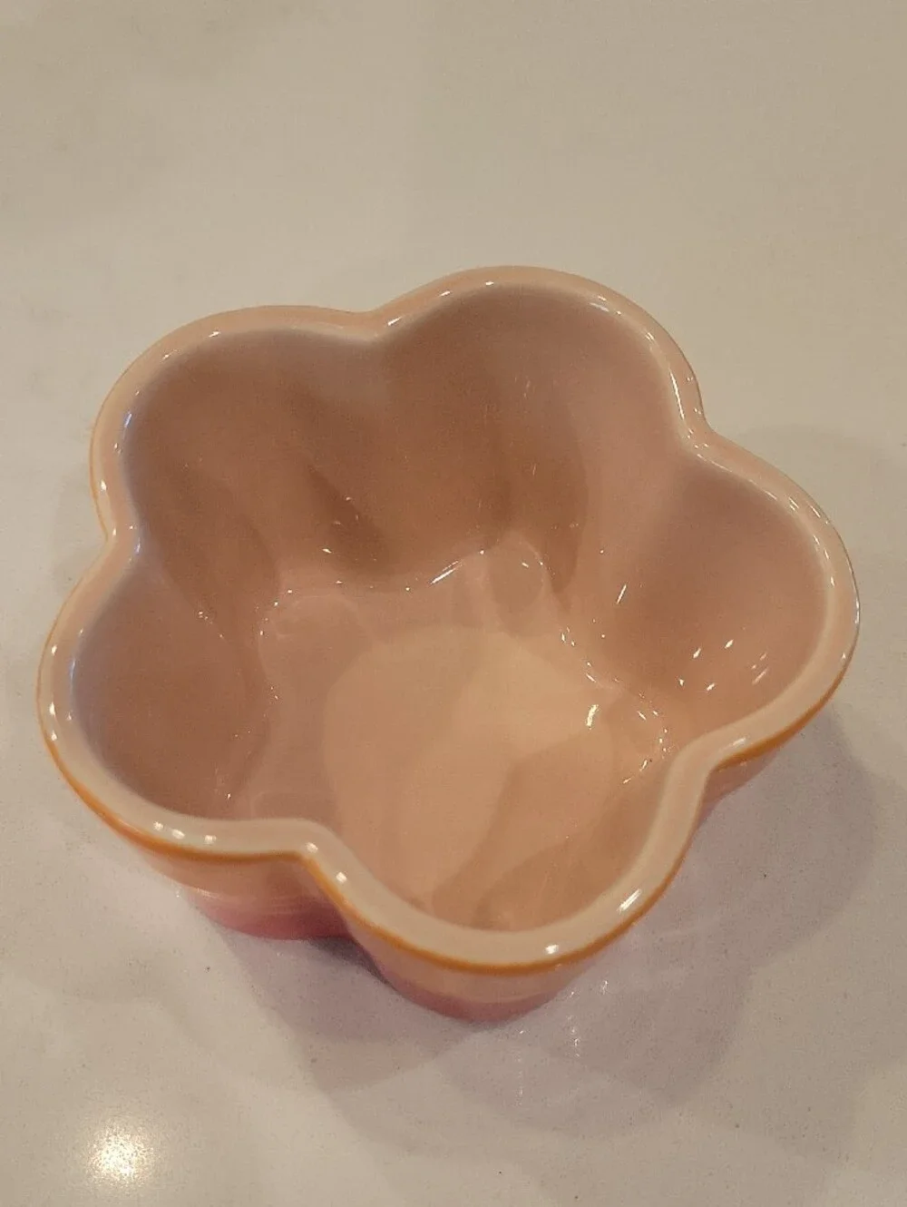 Le Creuset Flower-Shaped Stoneware Cocotte in Flame Orange